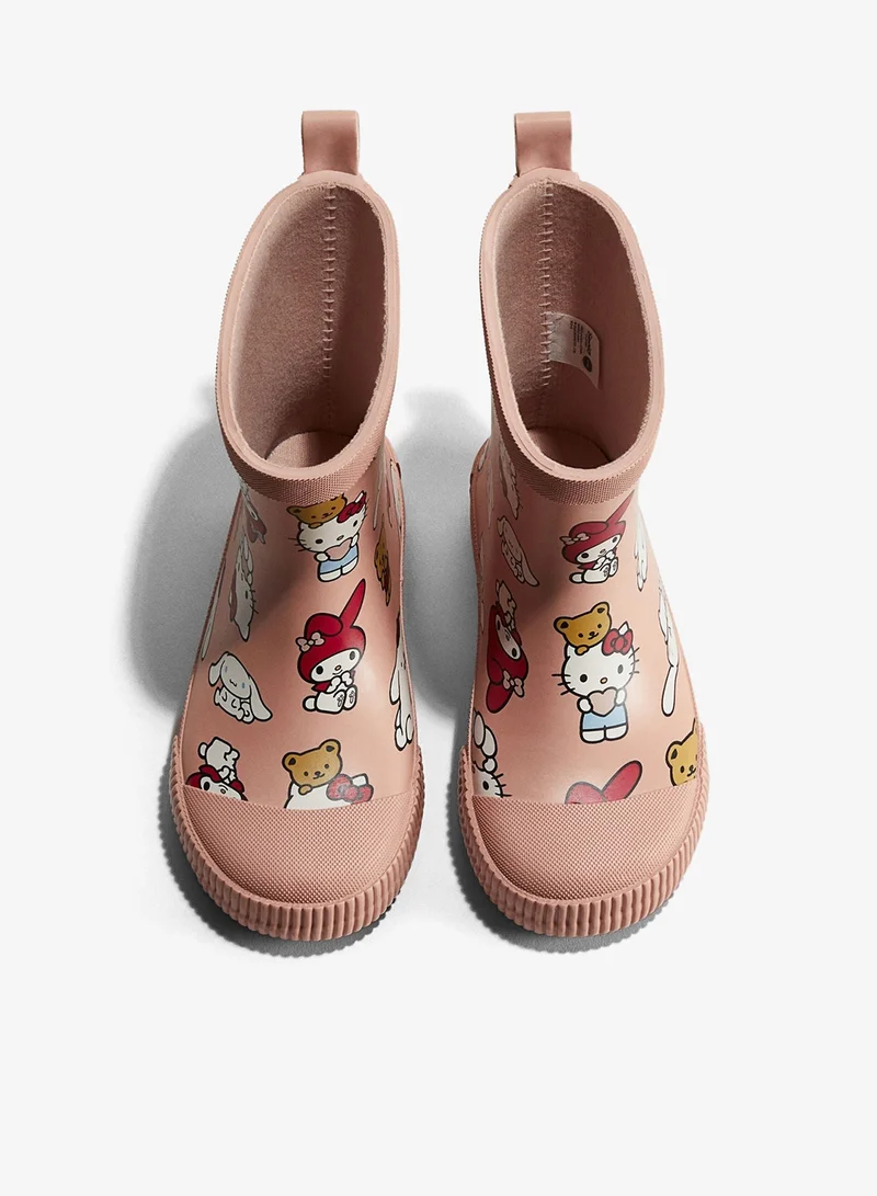 اتش اند ام حذاء ويلنغتون مزين بطبعات