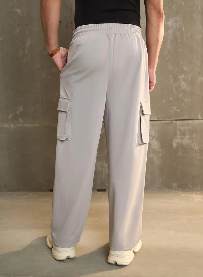 SASSAFRAS Sassafras Mid Rise Wide Leg Pants with Side Pockets Detail