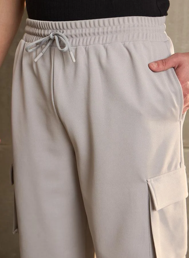 SASSAFRAS Sassafras Mid Rise Wide Leg Pants with Side Pockets Detail