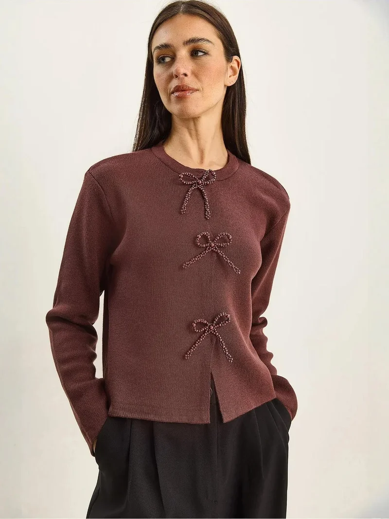 بيانكو لوتشي كارديجان محبوك بياقة دائرية وتفاصيل فيونكة