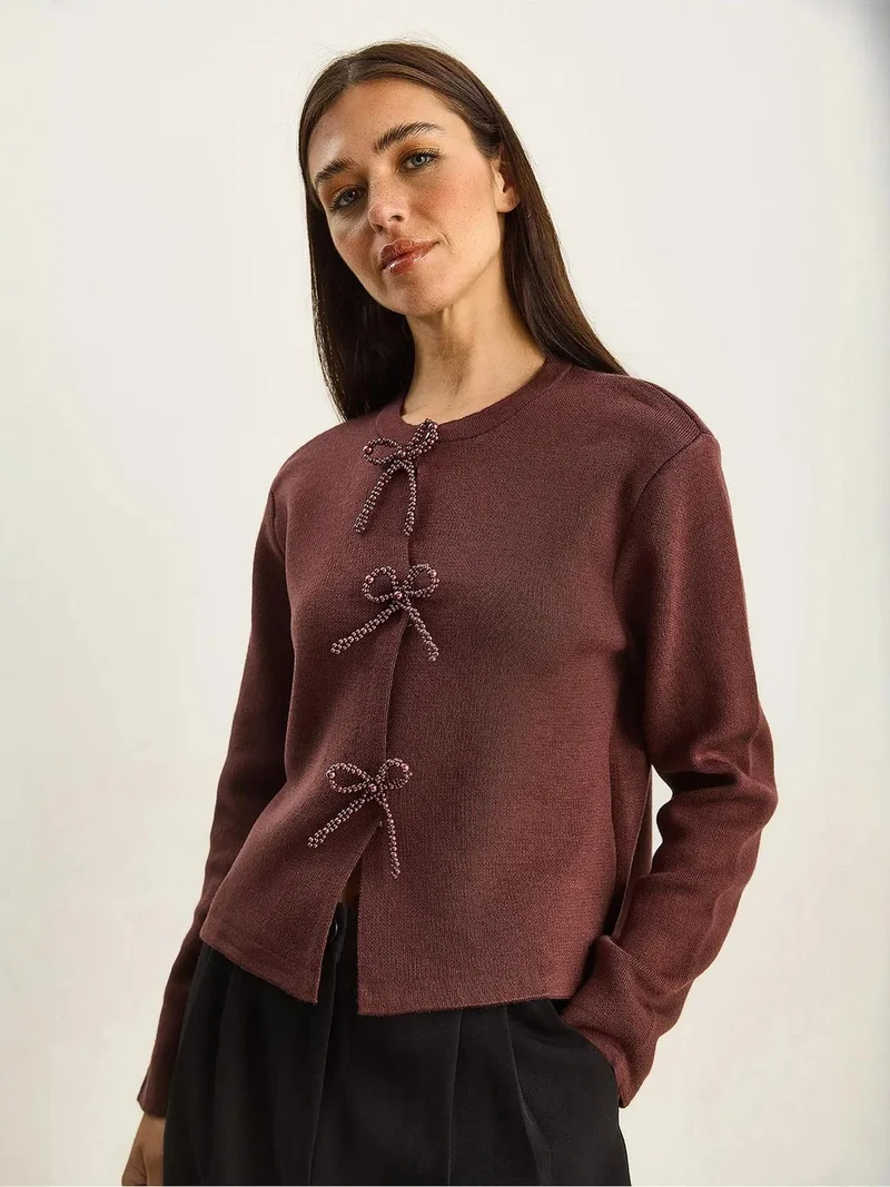 بيانكو لوتشي كارديجان محبوك بياقة دائرية وتفاصيل فيونكة