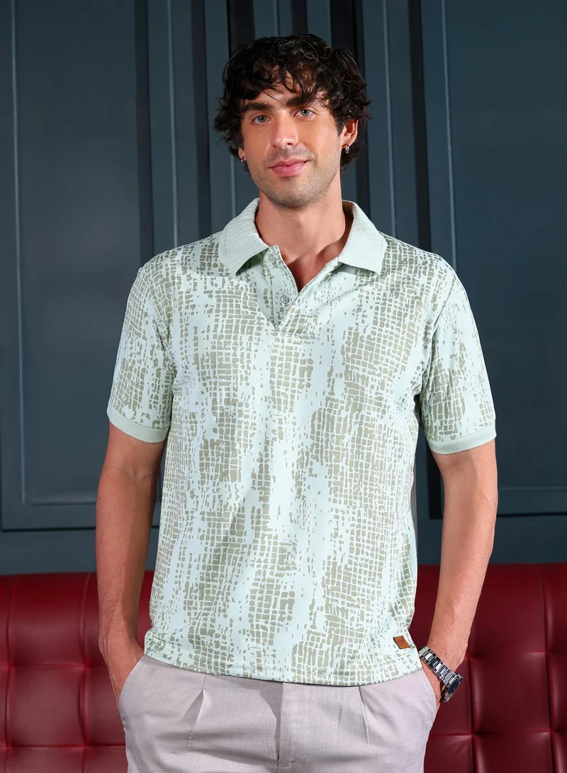 Campus Sutra Men Abstract-Gravel Print Polo T-Shirt | Jacquard Polo Neck, Short Ribbed-Cuff Sleeves | Half-Button , Straight Hem | Abstract Print Pique Knit Fabric For Casual & Daily Wear | Pistachio