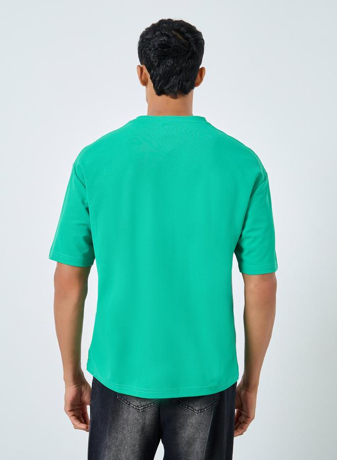 Styli Oversized Cut and Sew Detailing Graphic Printed T-Shirt - Image 4