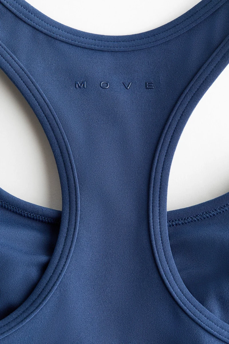 H&M  Medium Support Sports bra with SoftMove™ for Women | Best Price UAE