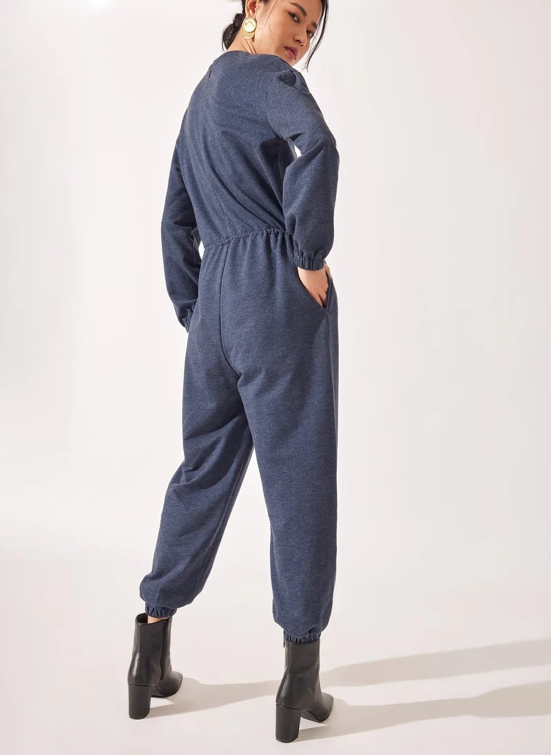 The Label Life Long Sleeve Drwastring Jumpsuit