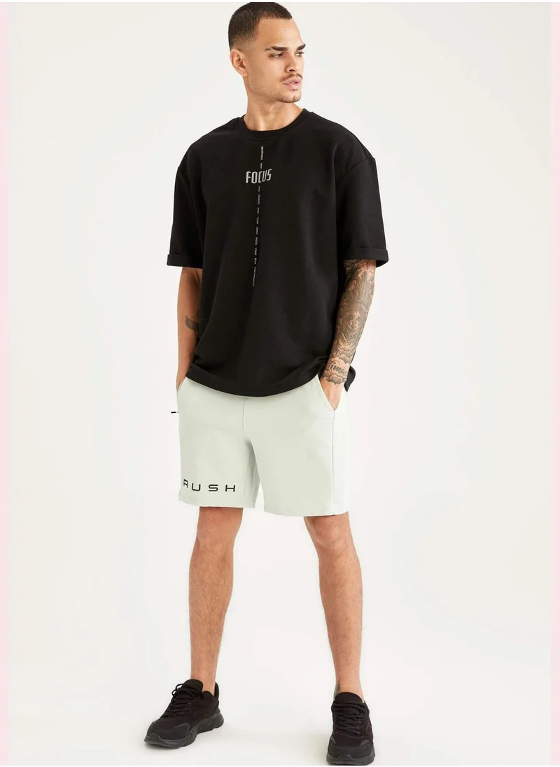 DeFacto Slim Fit Text Print Sports Short