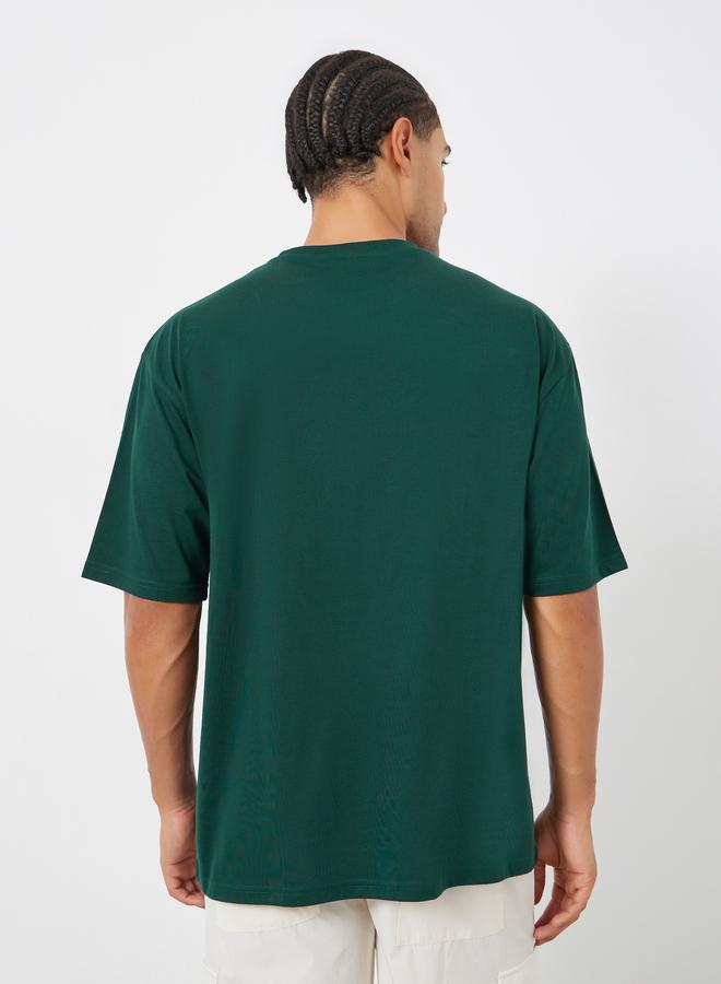 Styli Men Green Oversized Graphic Print T-Shirt - Image 5