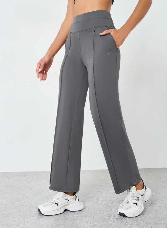 Styli Active Women Rubber Logo Self Fabric Straight Leg Leggings