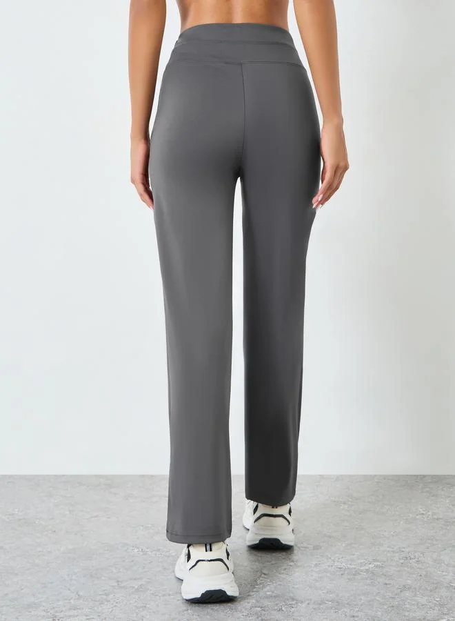 Styli Active  Women Rubber Logo Self Fabric Straight Leg Leggings for Women | Best Price UAE