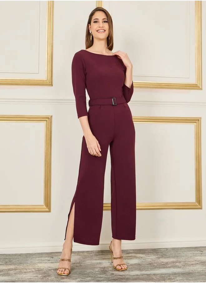 ستايلي Textured Belted V Back Detail Wide Leg Jumpsuit with Side Slit