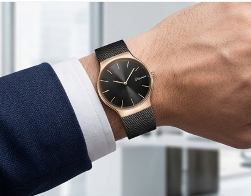 Elanova The Elanova watch is elegant with a stainless steel Milanese mesh strap and rose gold hour markers. - Image 2