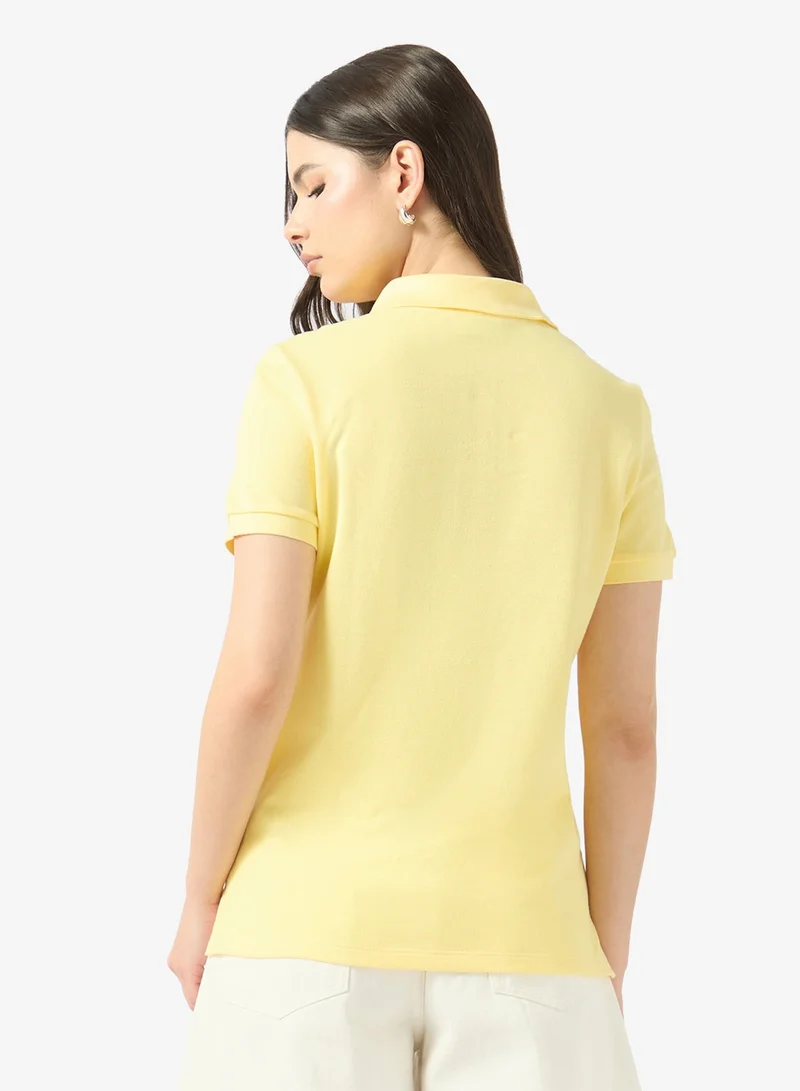 لاكوست بولو بشعار