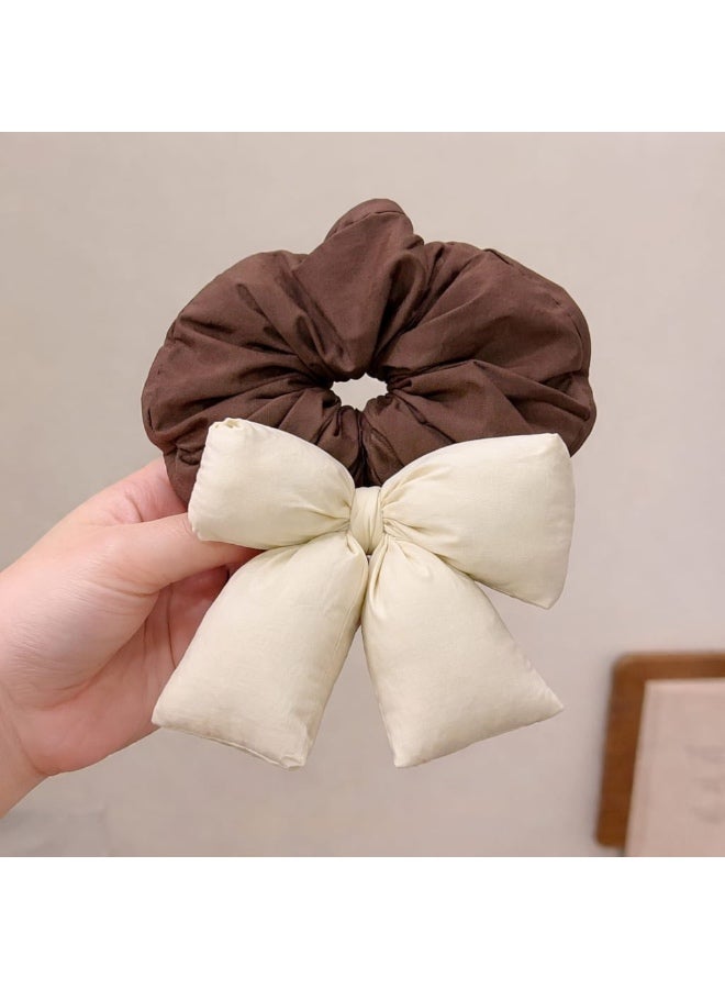 : Women’s hair tie with a new trendy design, featuring a padded and three-dimensional bow, made in bright and different colors, soft and lightweight on the hair, suitable for daily use and special occasions, and adds an elegant and modern touch to the look.