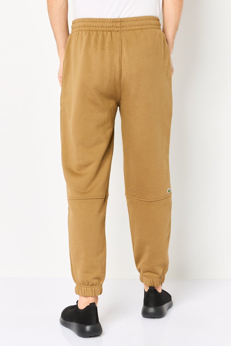 LACOSTE Men Relaxed Fit Embroidered Logo Sweatpants, Tan - Image 4