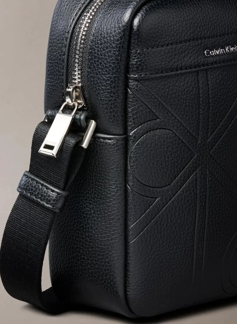 Calvin Klein Black Allover Embossed Emblem Logo Slim Reporter Bag for Men | Best Price UAE