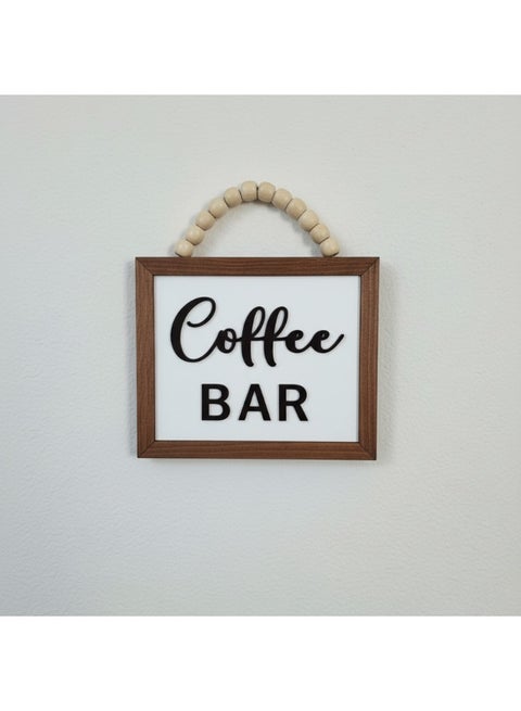A uniquely designed wooden display stand featuring the words "Coffee Bar" in embossed lettering, measuring 20x17 cm, made from premium 10mm thick Spanish MDF wood with a sturdy stand, adding elegance and beauty to your kitchen; perfect for coffee corner decor.