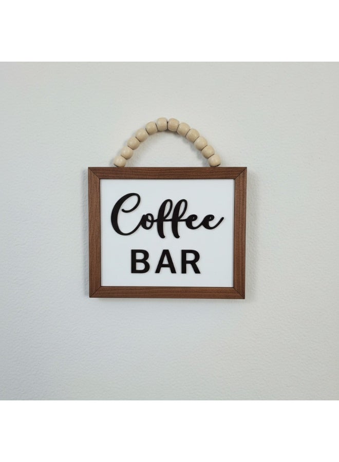 A uniquely designed wooden display stand featuring the words "Coffee Bar" in embossed lettering, measuring 20x17 cm, made from premium 10mm thick Spanish MDF wood with a sturdy stand, adding elegance and beauty to your kitchen; perfect for coffee corner decor. - Image 1