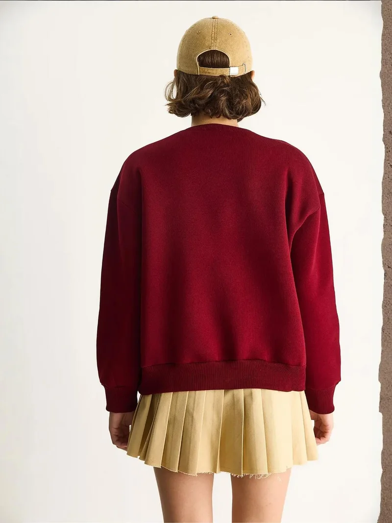 Bianco Lucci LUCCI Embroidered Crew Neck Long Sleeve Sweatshirt