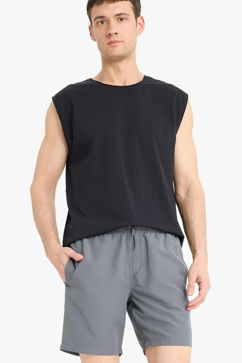 Defacto  Regular Fit Mesh Lined Lightweight Fabric Swim Shorts for Men | Best Price UAE