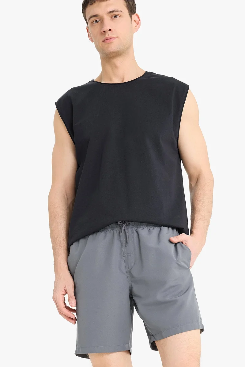 Defacto  Regular Fit Mesh Lined Lightweight Fabric Swim Shorts for Men | Best Price UAE