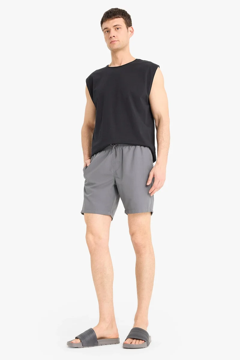 Defacto  Regular Fit Mesh Lined Lightweight Fabric Swim Shorts for Men | Best Price UAE