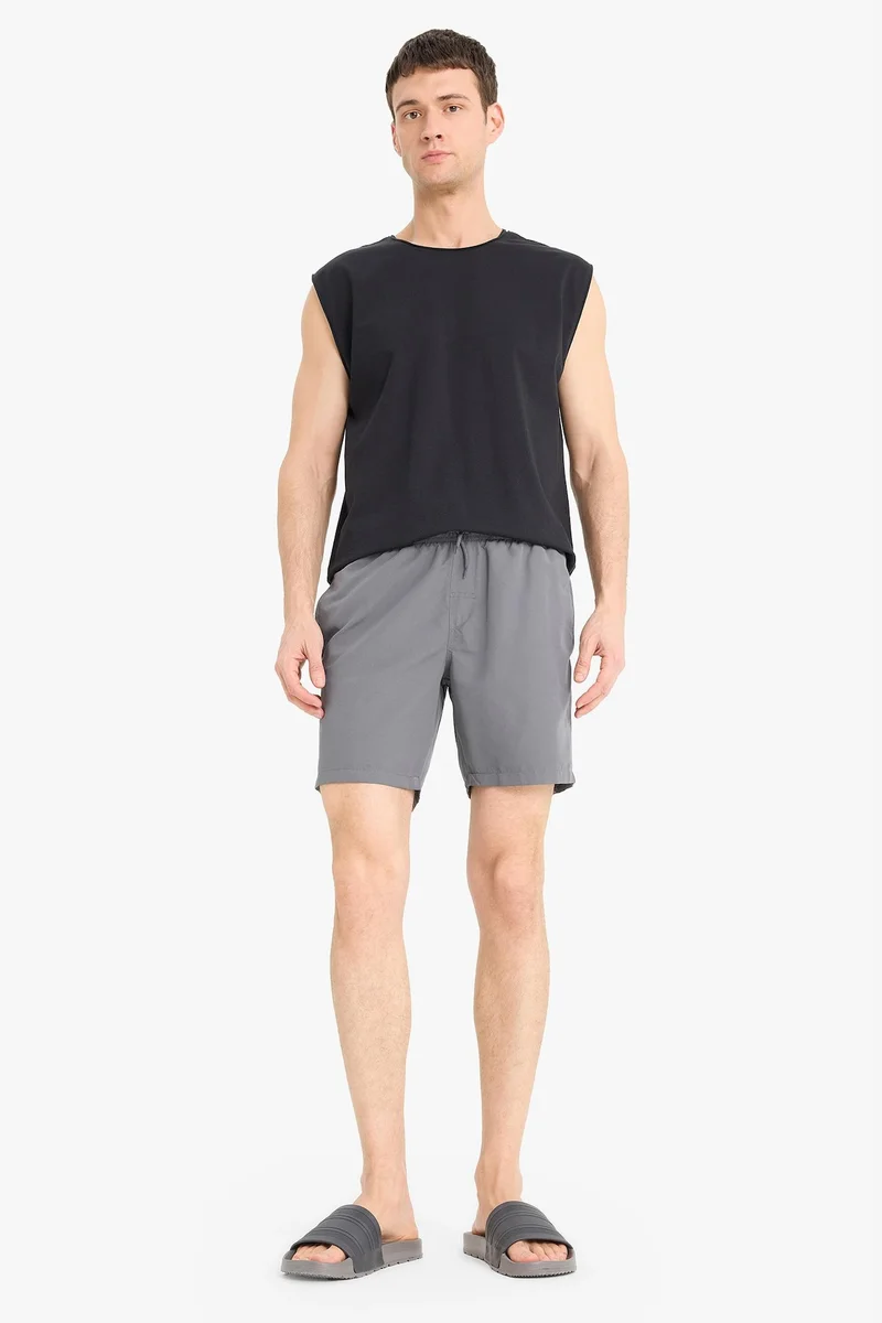 Regular Fit Mesh Lined Lightweight Fabric Swim Shorts