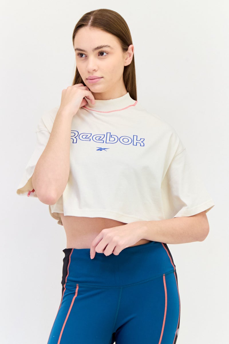 Reebok Women Sportswear Fit Short Sleeve Outdoor Cropped T-Shirt, Off White  - Image 1