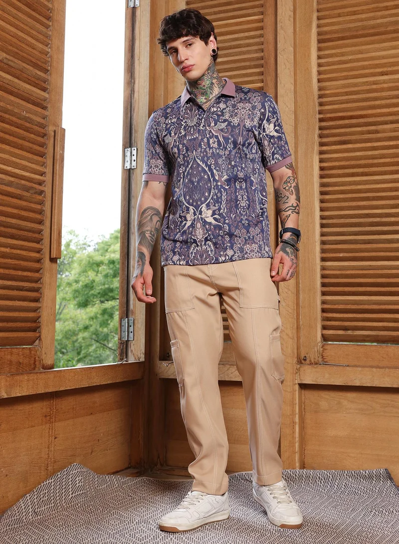 Campus Sutra Campus Sutra Men's Indigo Blue:Mauve Purple Indie Floral Jacquard-Knit Polo T-Shirt | Regular Fit Half Sleeve Polo Collar | Floral & Ornamental Print | Cotton Blend Fabric | Casual & Street Wear