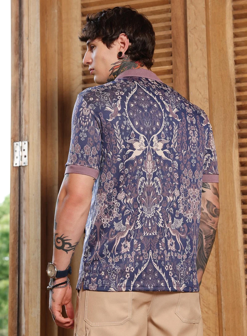 Campus Sutra Campus Sutra Men's Indigo Blue:Mauve Purple Indie Floral Jacquard-Knit Polo T-Shirt | Regular Fit Half Sleeve Polo Collar | Floral & Ornamental Print | Cotton Blend Fabric | Casual & Street Wear