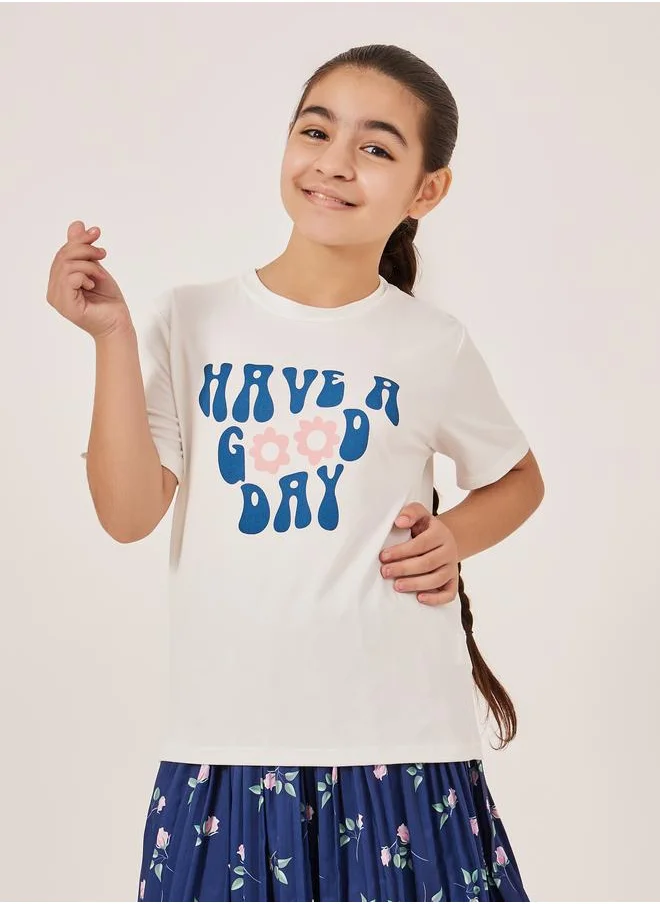 ستايلي Styli Slogan Print T-Shirt and All-Over Print Skirt