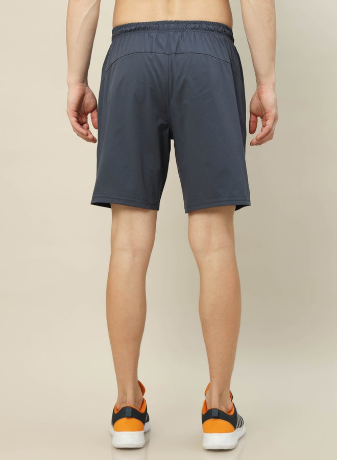 تكنوسبورت شورت مطاطي ثنائي الاتجاه بلون سادة - Image 4