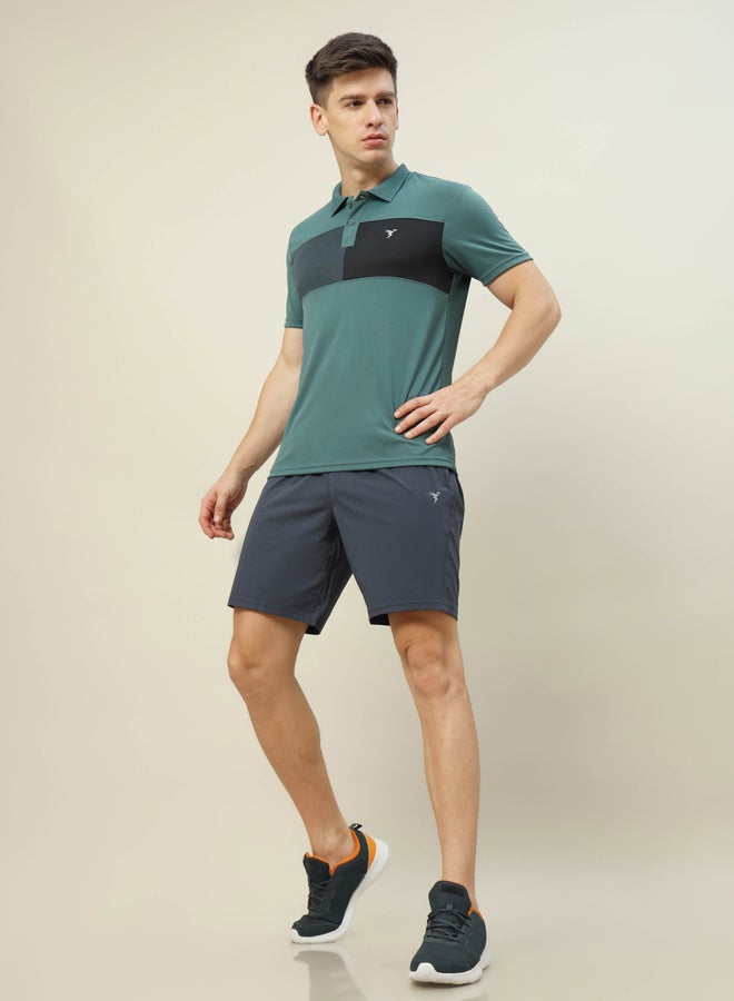 تكنوسبورت شورت مطاطي ثنائي الاتجاه بلون سادة - Image 5