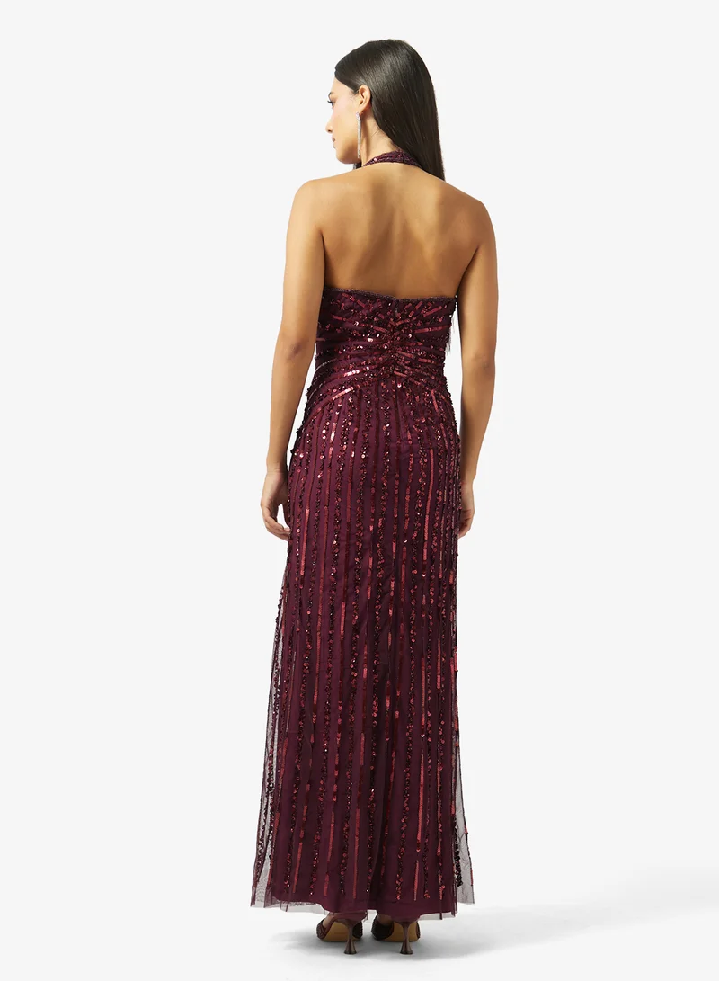 نمشي x فستان بياقة هالتر مزين