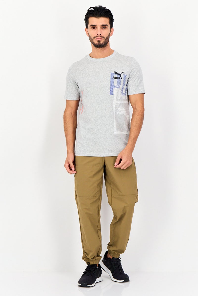 PUMA تي شيرت رياضي للرجال بأكمام قصيرة بشعار العلامة التجارية، رمادي فاتح - Image 4