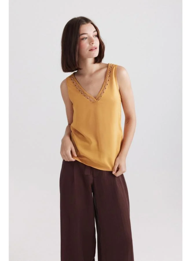 Springfield Embroidered neckline vest top
