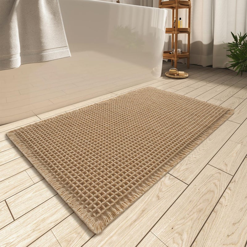 AMOAMI Upgraded Waffle Bath Mat Super Absorbent Non Slip Bath Mats for Bathroom Floor Machine Washable Bathroom Rugs with Tassels Rubber Backed Bathroom Mats Ultra Soft 17 x 24 Brown