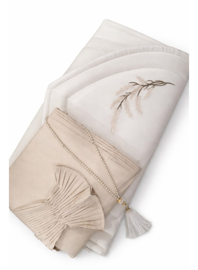 This distinctive prayer set includes a prayer mat with a foam lining in the shape of a mihrab, a plain prayer robe with pleats, and an attached headscarf. One large size for women.