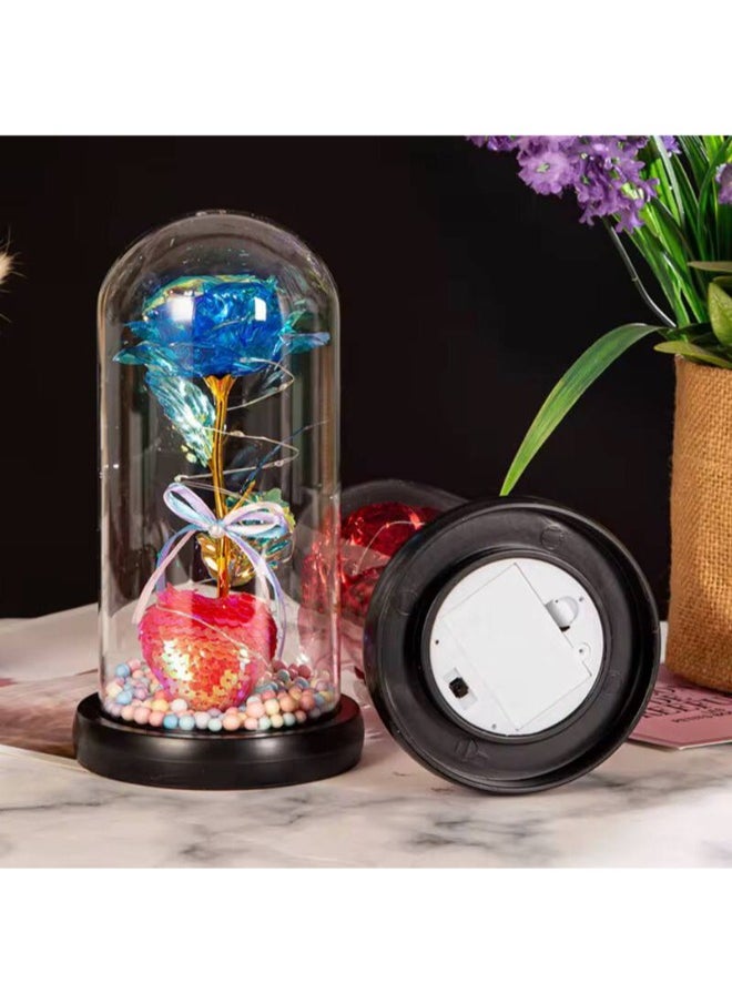 Generic - Surprise your loved ones with this Beauty and the Beast Enchanted Rose, a stunning red silk rose encased in a glass dome with LED lights and a pinewood base. A timeless symbol of love, perfect for Birthday Gifts for Women, Mum, Grandma, Sister, or Nan. Ideal for Anniversary, Valentine's Day, Mother's Day, and Christmas. Create a magical ambiance with this elegant and heartfelt keepsake. - Image 1