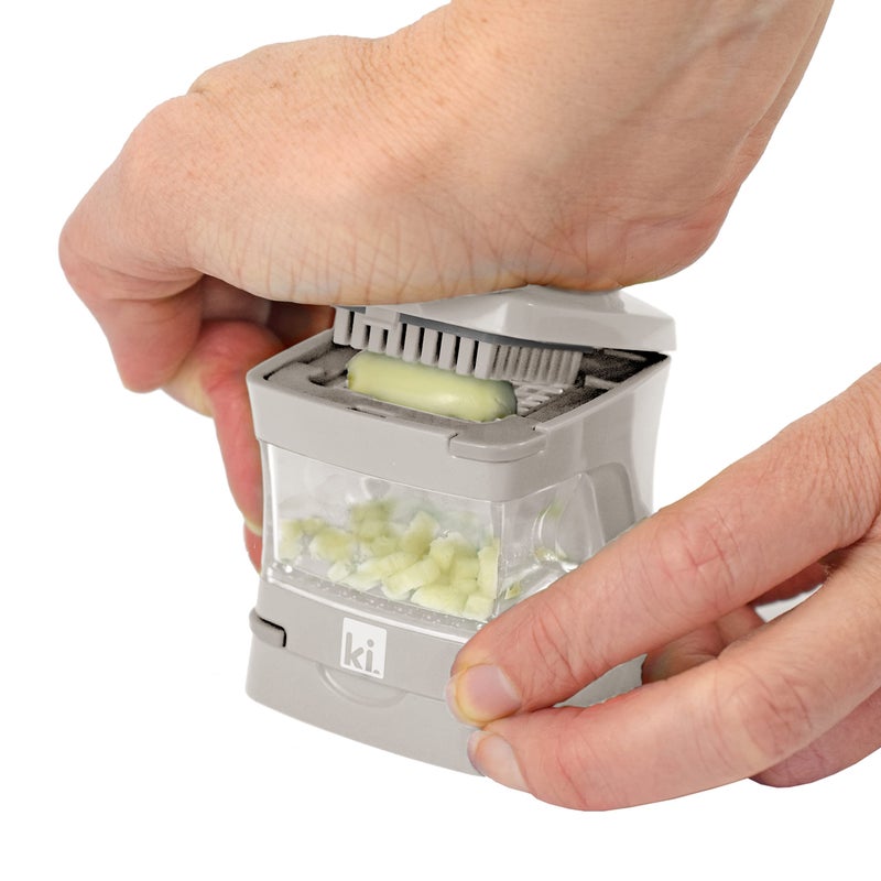 Kitchen Innovations Garlic-A-Peel Garlic Press  Crusher  Cutter  Mincer  And Storage Container - Includes Silicone Garlic Peeler - Easy To Clean - Stainless Steel Blades - (Cream)  Standard - Image 3