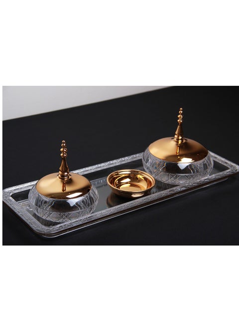 A set of luxurious plates for serving dates with a luxuriously designed tray