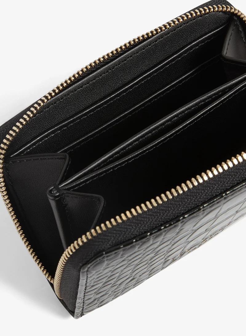 تيد بيكر محفظة صغيرة بسحاب بتأثير التمساح