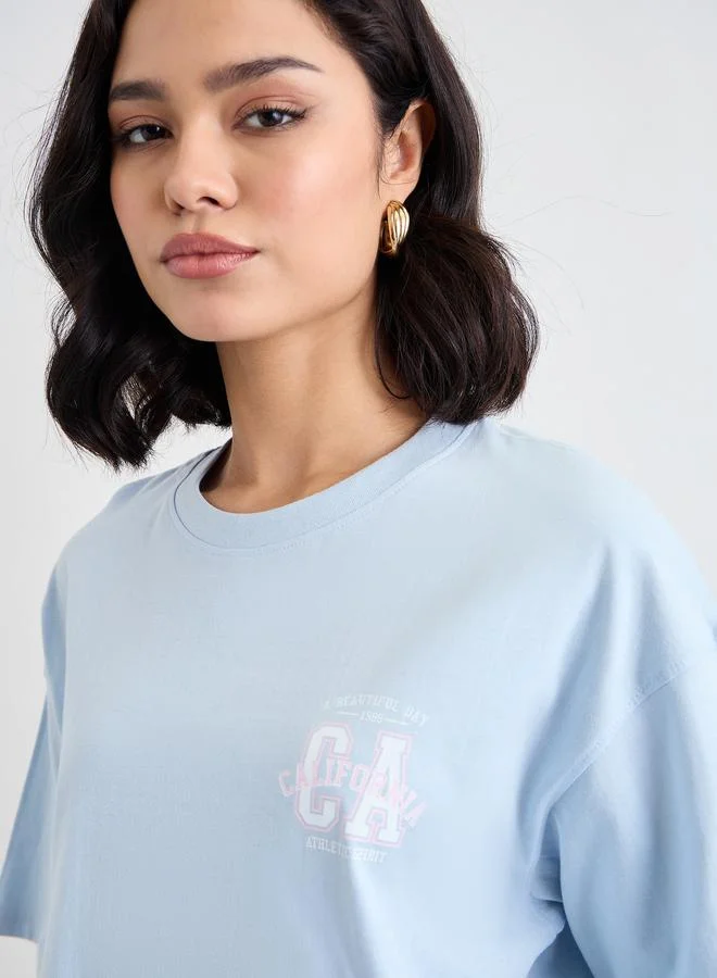 Styli Styli Slogan Print Crew Neck Oversized T-Shirt