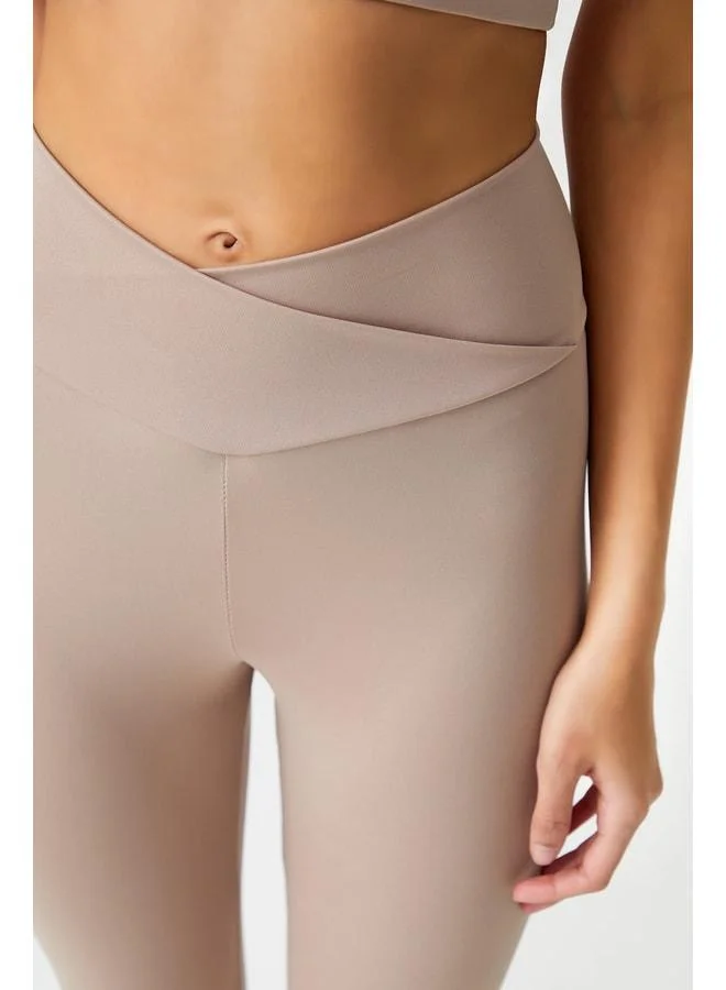 Los Ojos Beige Cross-Waist Detailed Leggings Envelope.