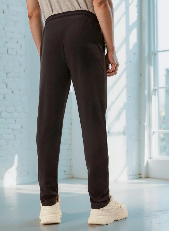 Kappa  Kappa Relaxed Fit Pants with Drawstring Closure & Pocket Detail for Men | Best Price UAE