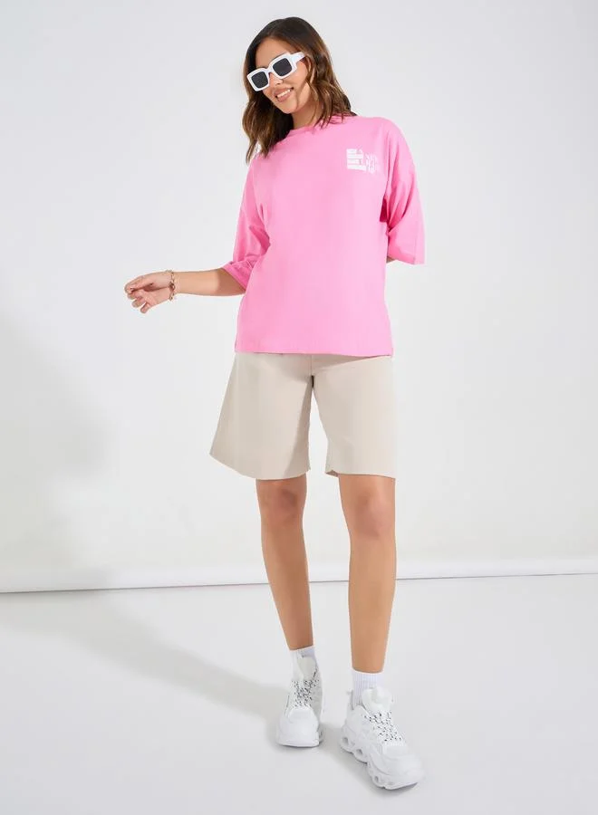 ستايلي Oversized Distressed Slogan T-Shirt with Dropped Shoulder
