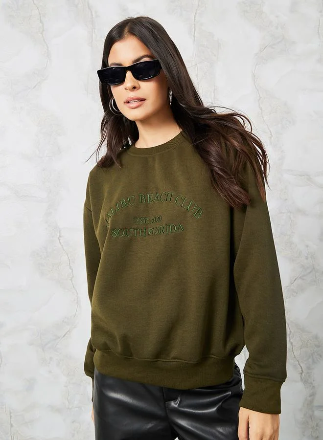 ستايلي Oversized Embroidered Slogan Cotton Sweatshirt