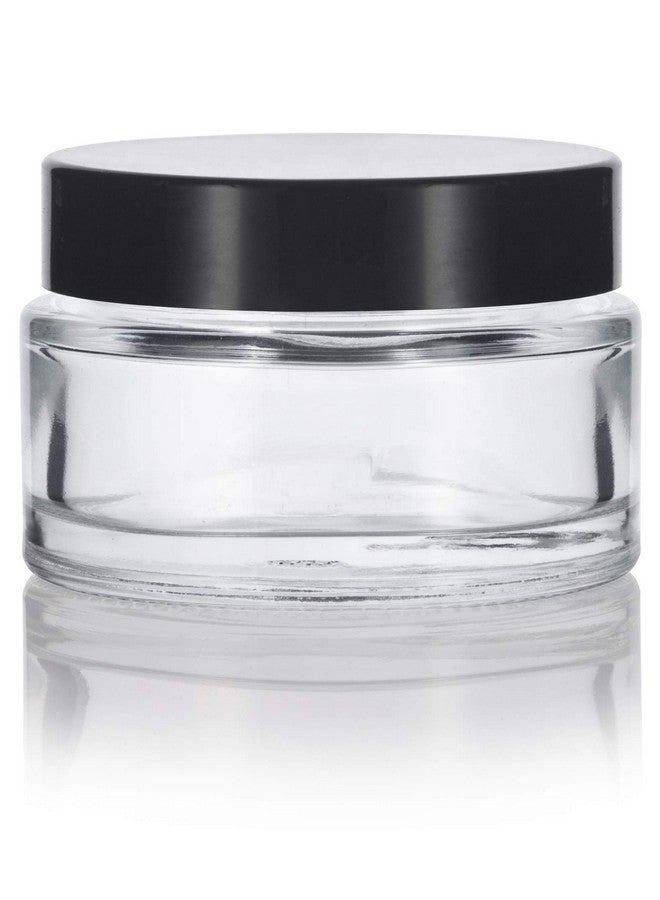 JUVITUS 1 Oz Clear Glass Low Profile Heavy Wall Balm Jars With Black Smooth Lids (12 Pack) - Image 1
