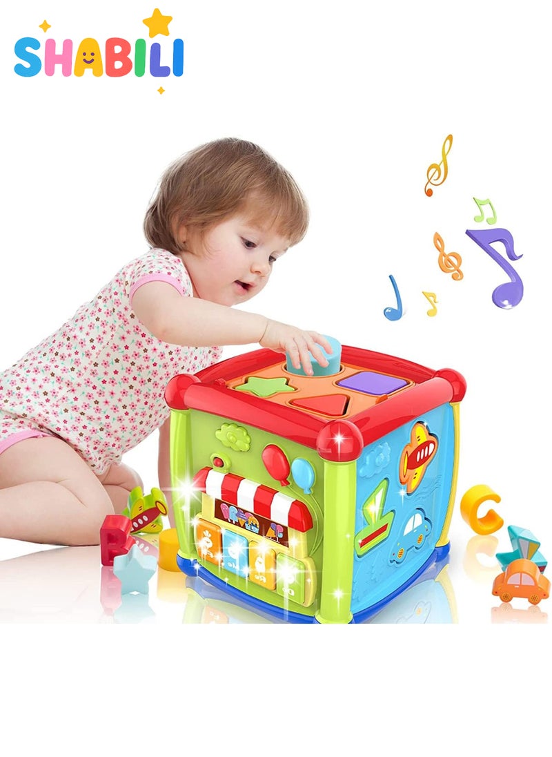شبيلي مكعب أنشطة للأطفال ٦ في ١، لعبة تعليمية مع موسيقى وضوء وامض، فرز الأشكال والحروف الأبجدية، لعبة تنمّي مهارات العلوم والتقنية والهندسة والرياضيات، للأولاد والبنات بعمر ١٨ شهرًا فأكثر، هدية عيد ميلاد مثالية (يتطلب ٣ بطاريات AAA غير مشمولة) (متعدد الألوان) - Image 1