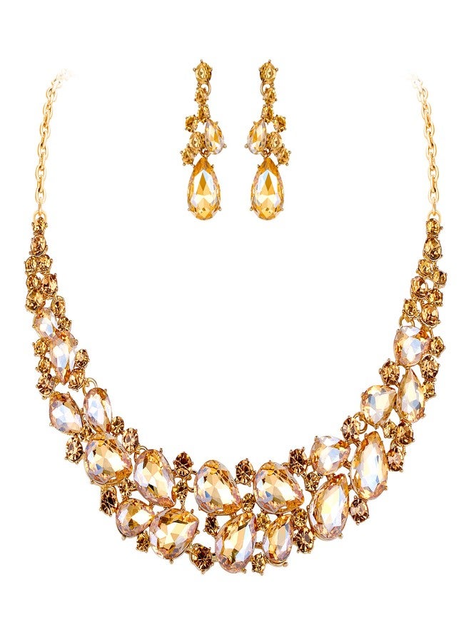 بريلوف طقم مجوهرات زفاف بريلوف للنساء، قلادة وأقراط متدلية مرصعة بكريستال نمساوي متعدد الطبقات بلون ذهبي شامباني. - Image 1