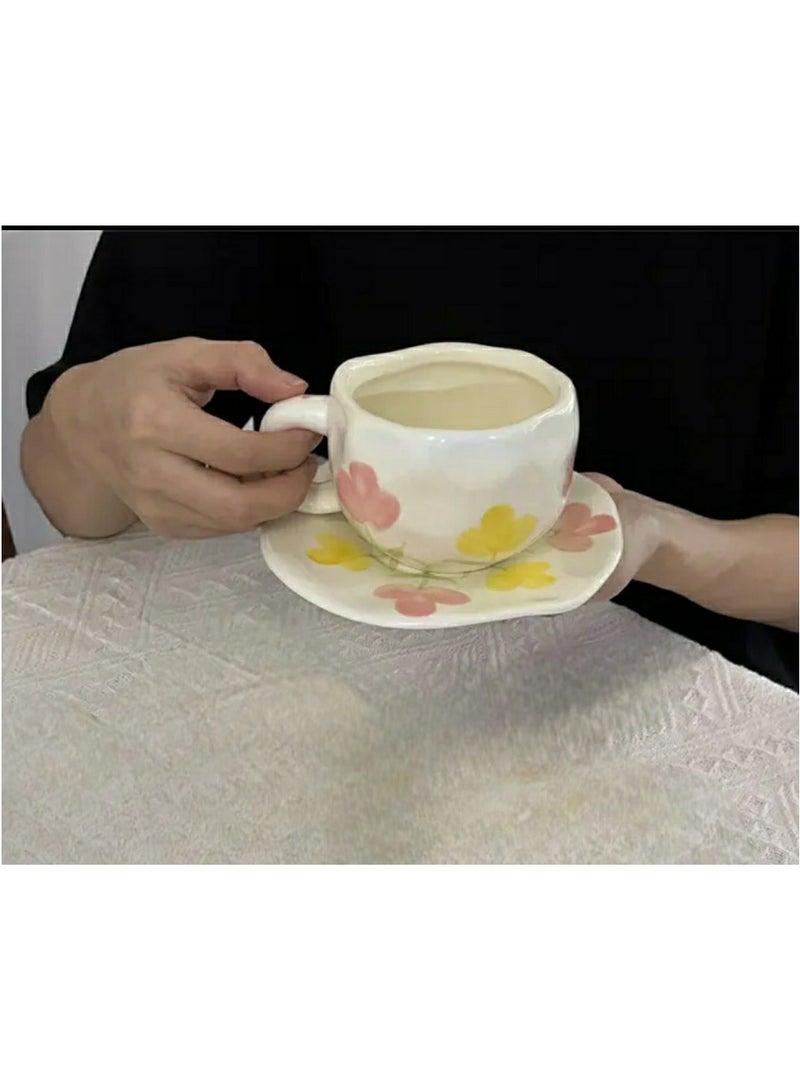 White ceramic coffee mug decorated with pink and yellow flowers - a touch of natural elegance - Image 1